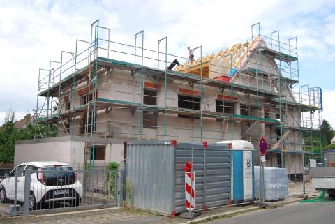 Neubau Reiheneckhaus mit drei Wohneinheiten und Carport